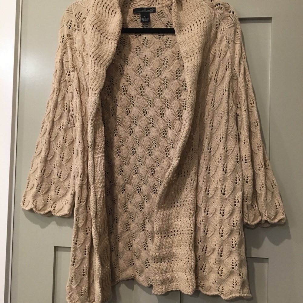 Crochet sweater with 3/4 sleeves.